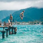 How Swimming Affects Health? Family & Friends Enjoy Swimming in the Ocean Pool